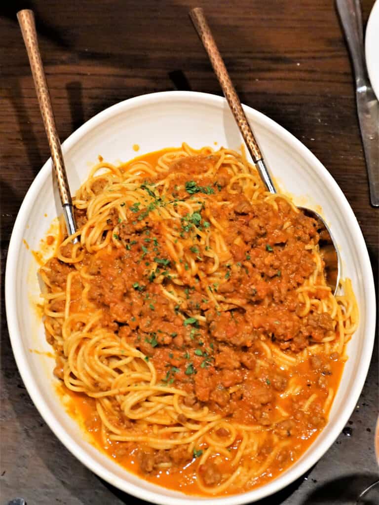 Spaghetti with meat sauce served family-style at Terralina Crafted Italian.