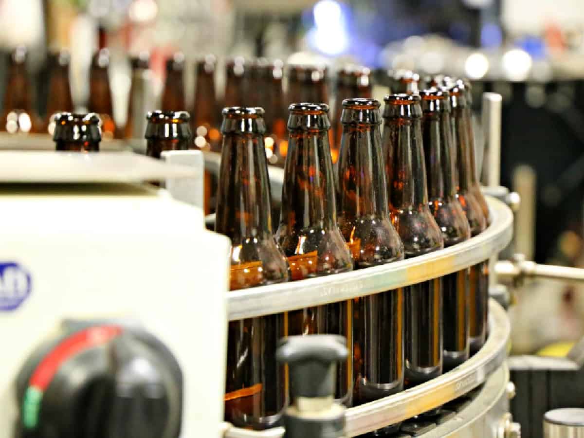 Beer bottles on the assembly line.
