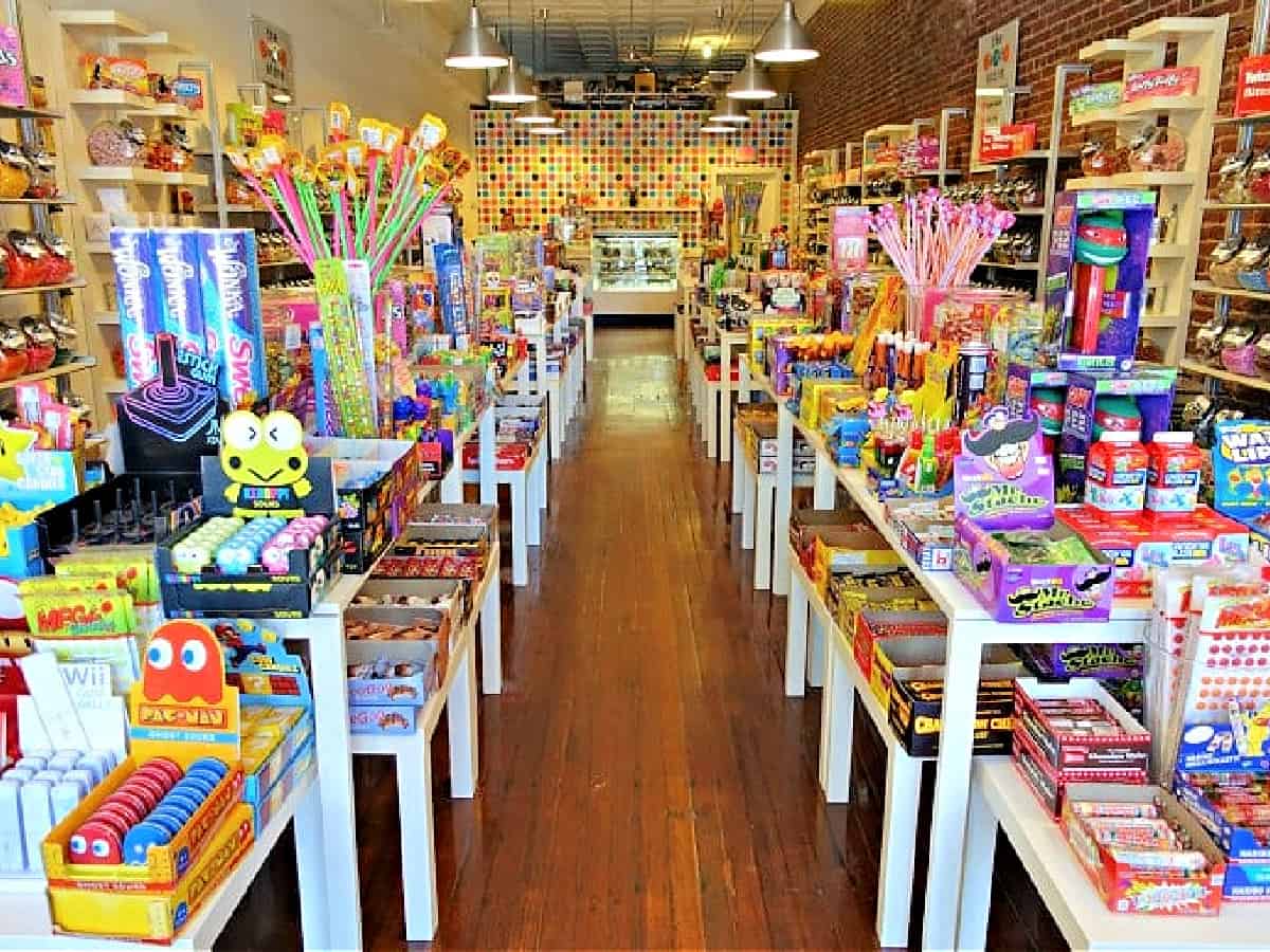 Candy shop with rows of candy.