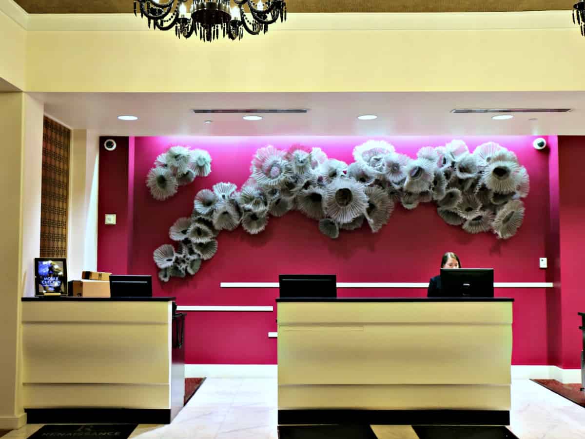 Front desk and check-in counter inside the Renaissance Pittsburgh Hotel lobby.