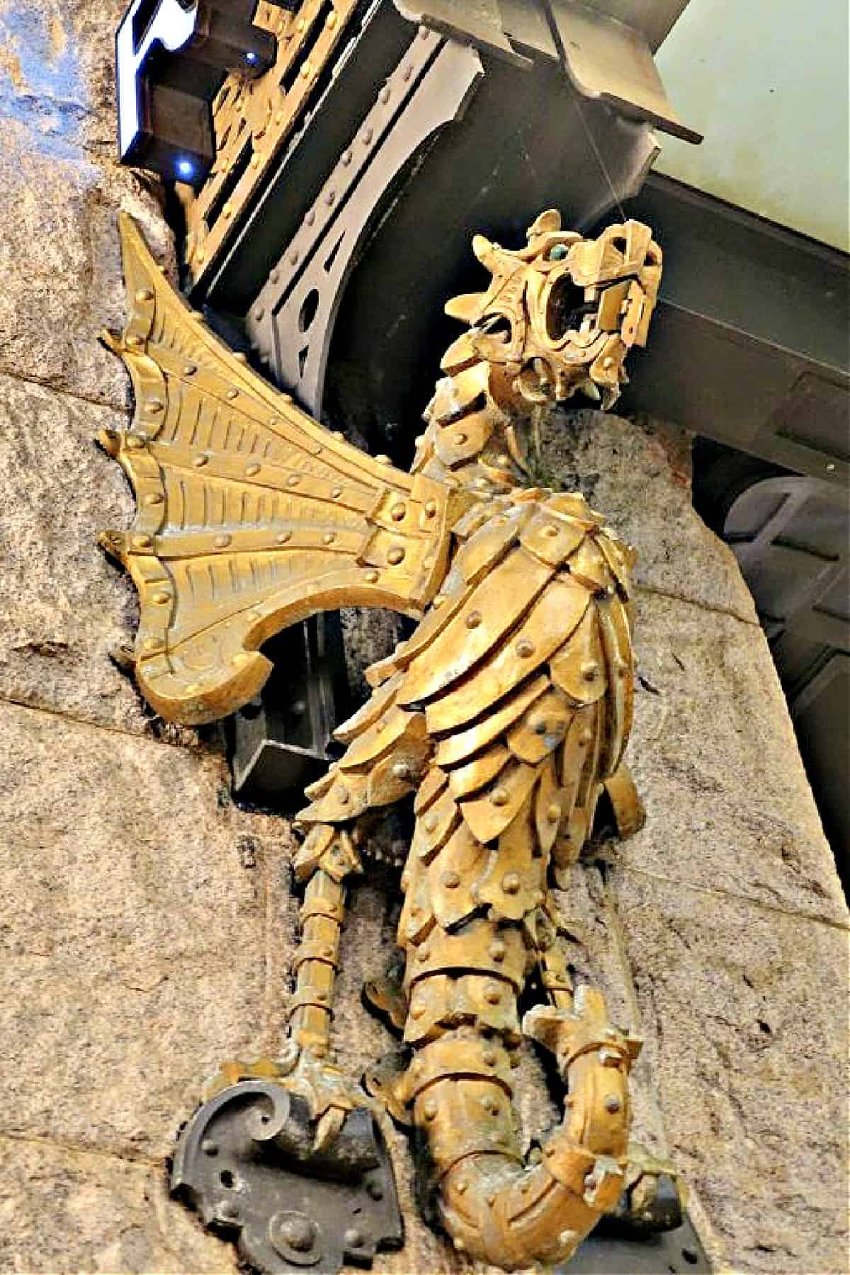 Metal dragon sculpture mounted on the exterior of the Renaissance Pittsburgh Hotel.