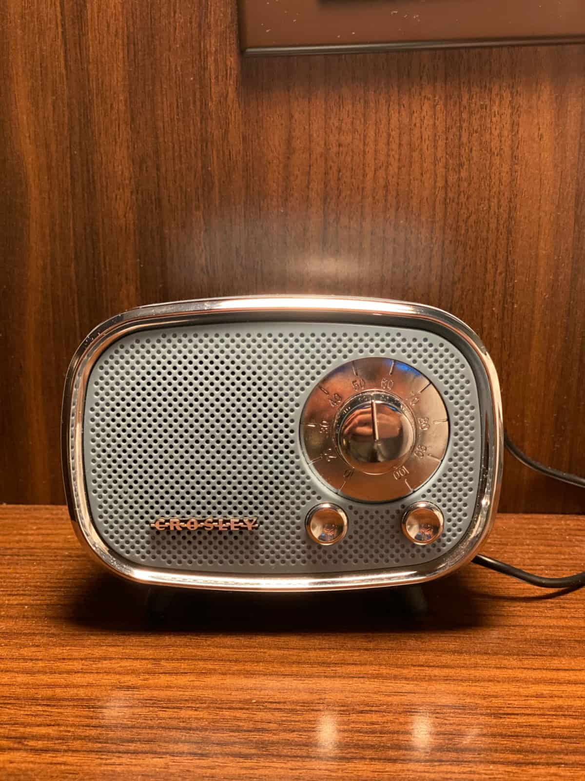 Small electronic device that looks like an old radio.