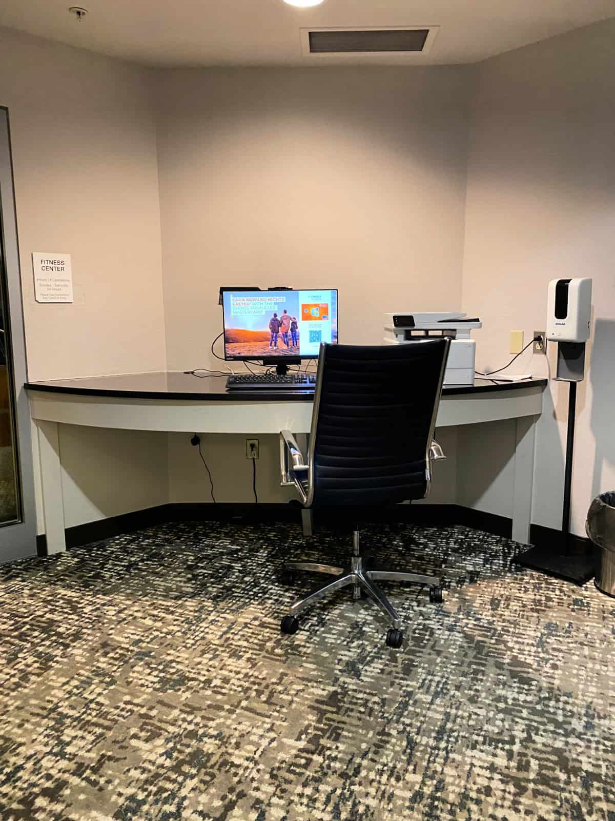 Computer, printer, and chair.