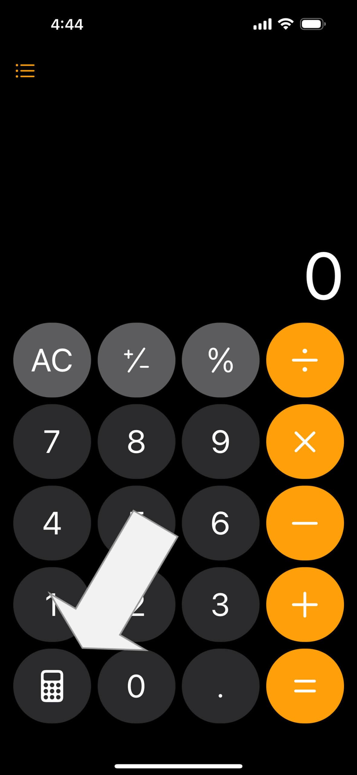 Screenshot of a calculator screen with an arrow pointing to the bottom left corner.