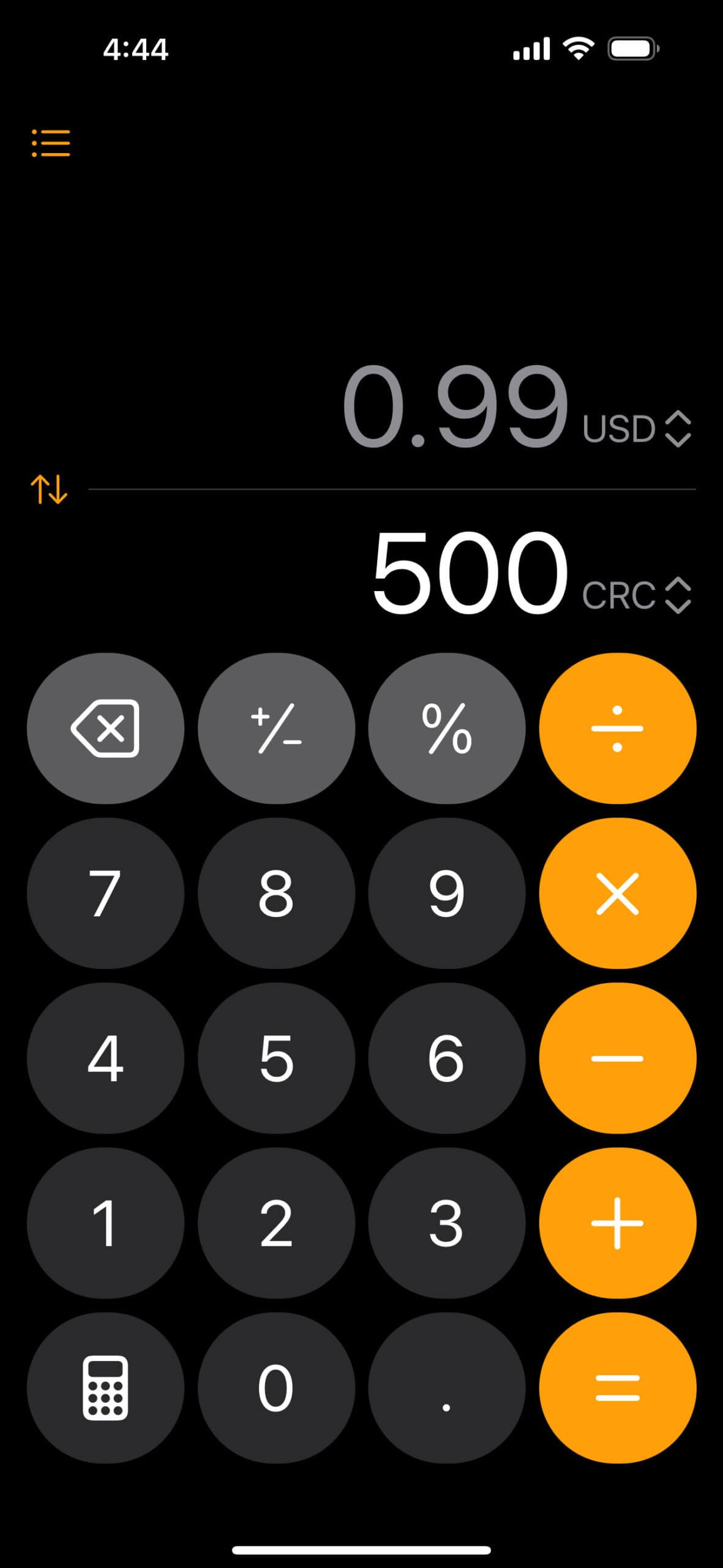 Screenshot of a calculator showing 500 colones is equal to ninety-nine cents.