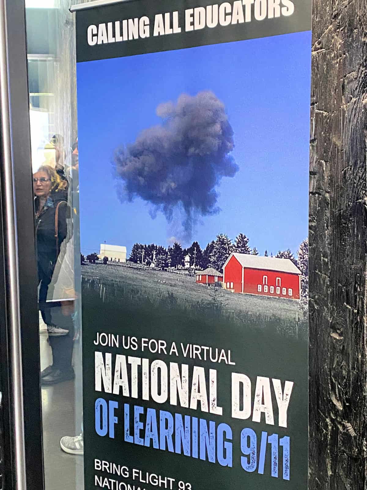 Poster showing large plume of smoke caused by a plane crash.