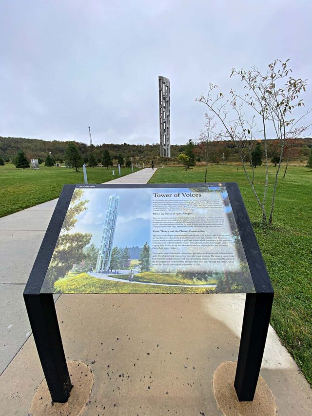 Tower of Voices monument in the middle of a field.