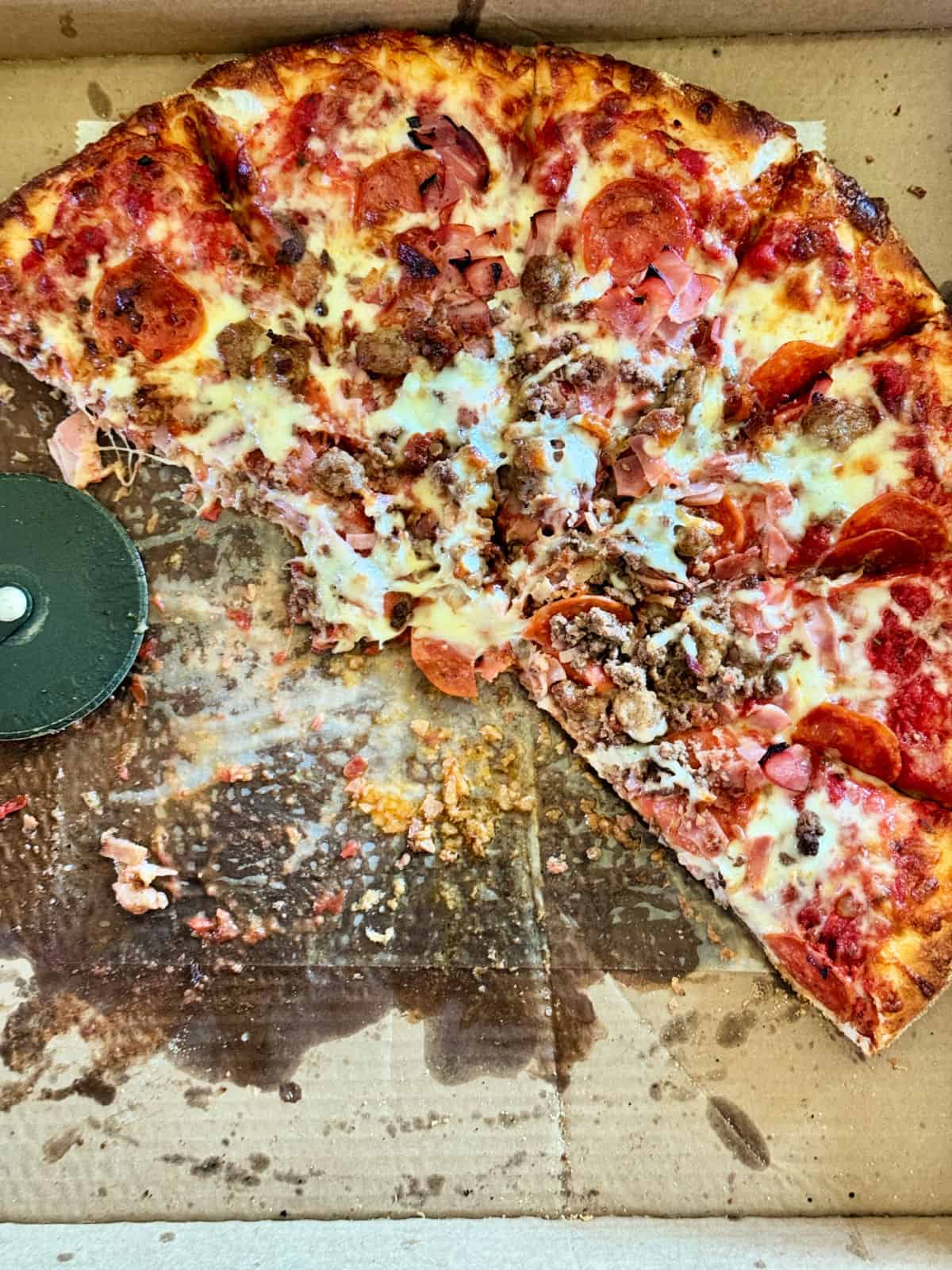 Thick, cheese-covered Mountains of Meat pizza from Jioio’s Restaurant in Latrobe.