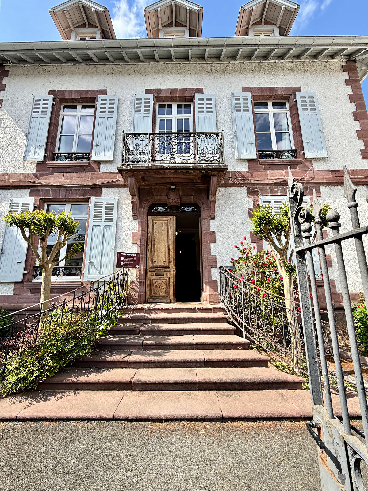 Hotel La Villa Esponda in Saint-Jean-Pied-de-Port, France, with stone steps, decorative iron railings, and traditional Basque architecture.