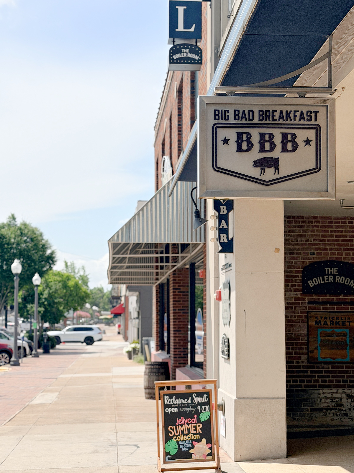 Entrance to Big Bad Breakfast in downtown Florence, Alabama, a popular breakfast restaurant serving Southern-inspired morning favorites.