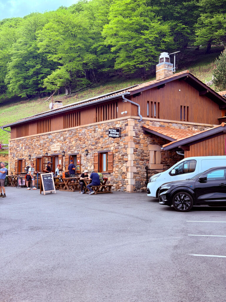 Refuge Auberge Orisson with outdoor picnic tables along the Camino de Santiago in the French Pyrenees.