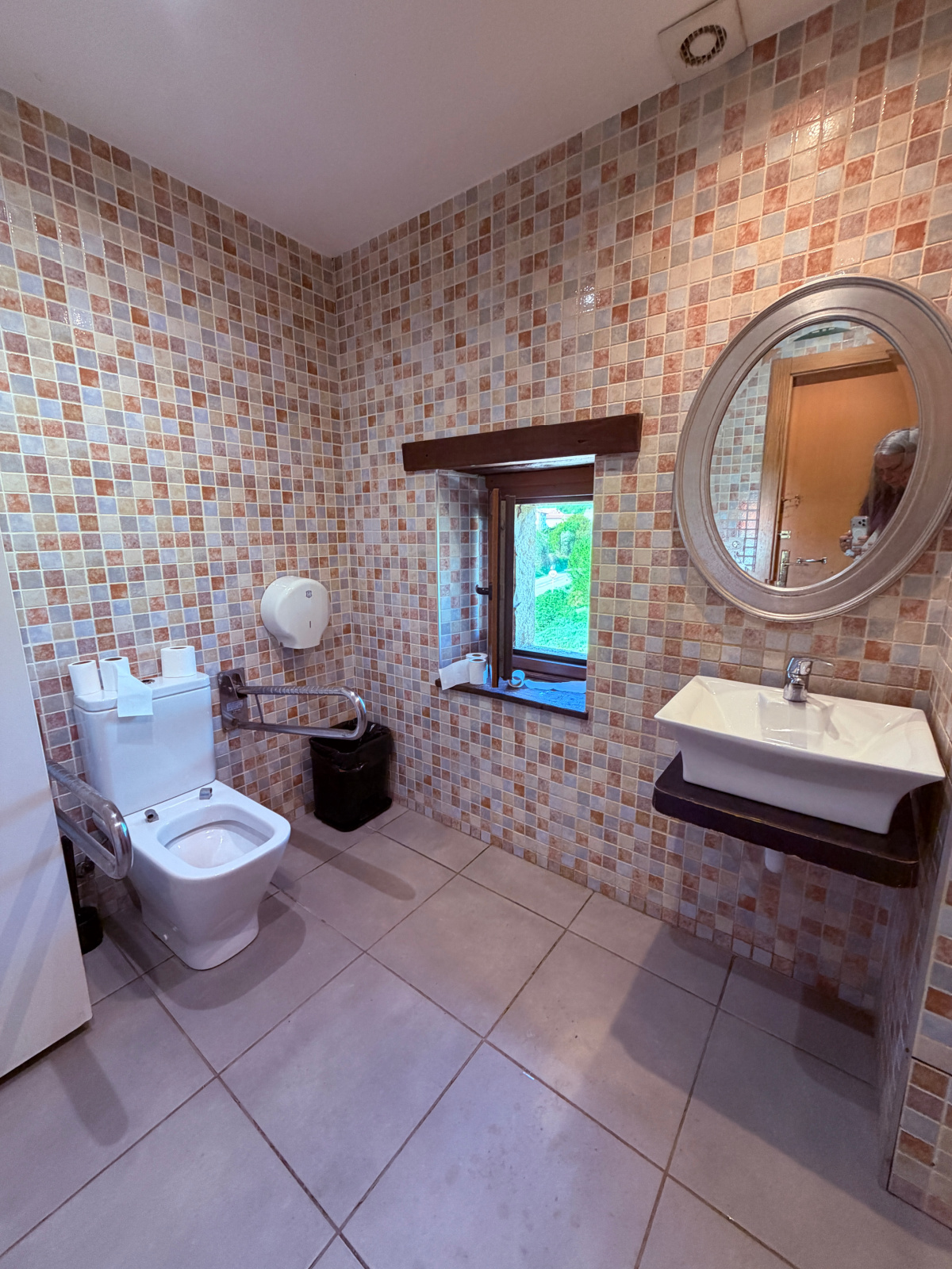 Bathroom facilities for pilgrims at Bar Dena Ona along the Camino de Santiago.