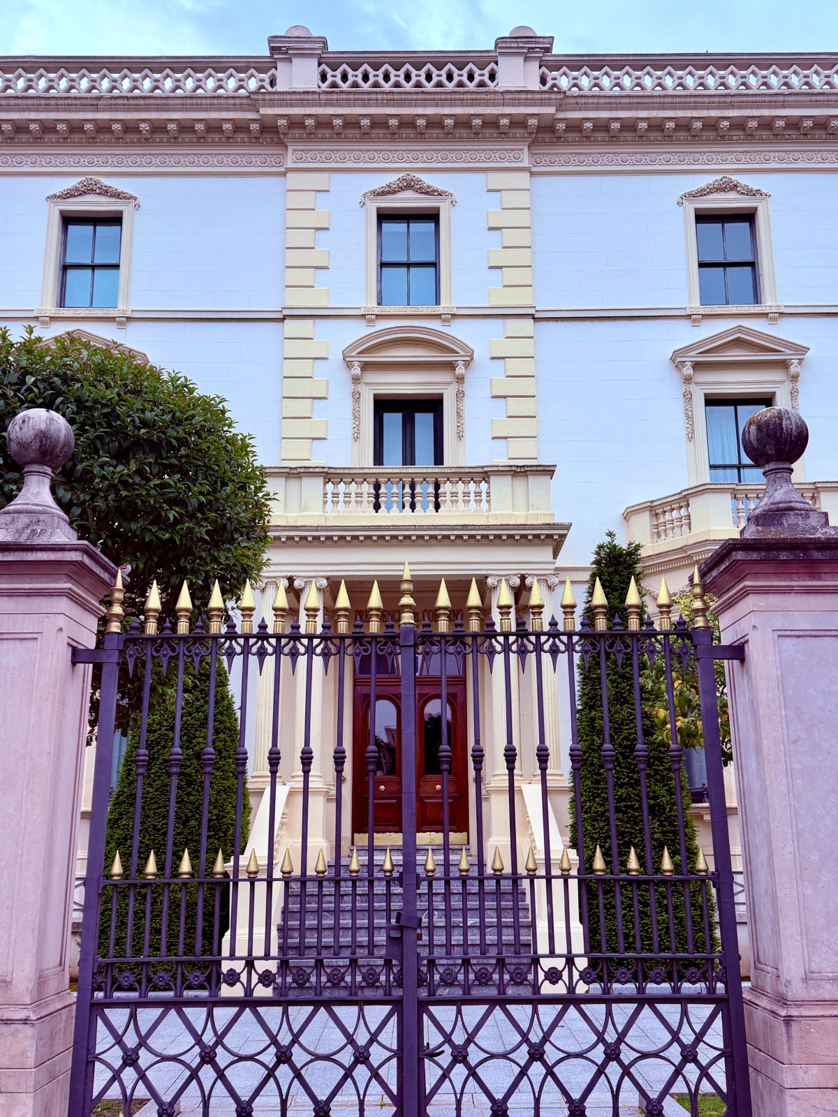 Gated entrance and ornate façade of the Palacete del Gobierno de La Rioja in Logroño.