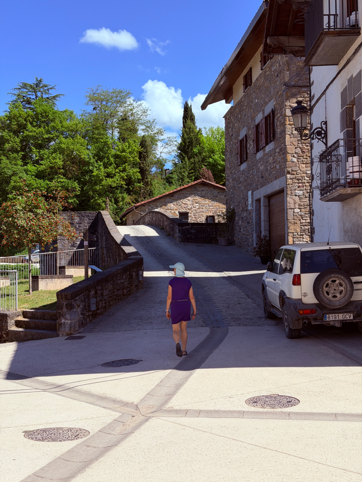 Medieval stone bridge crossing the Arga River in Zubiri, Spain.